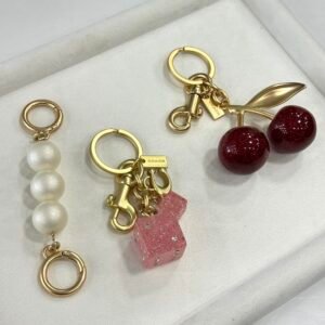 Coach charm